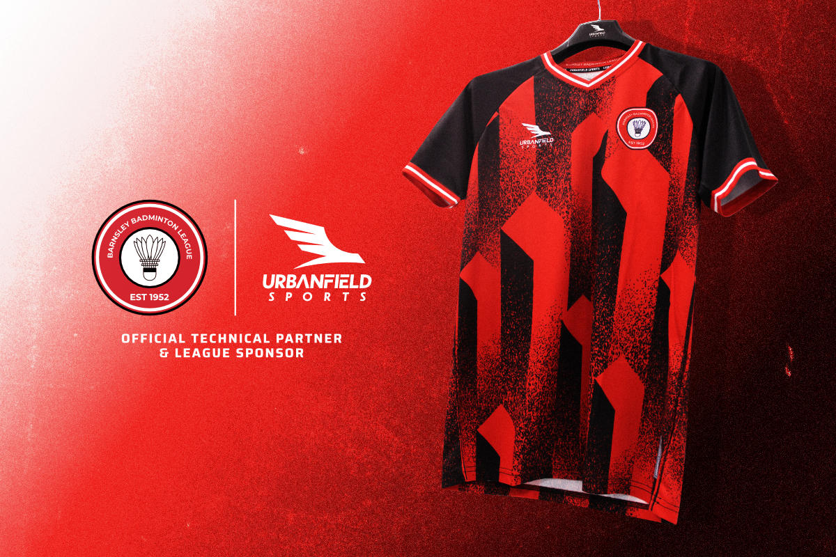 Barnsley Badminton League shirt on a black hanger in front of a dark red gradient background.