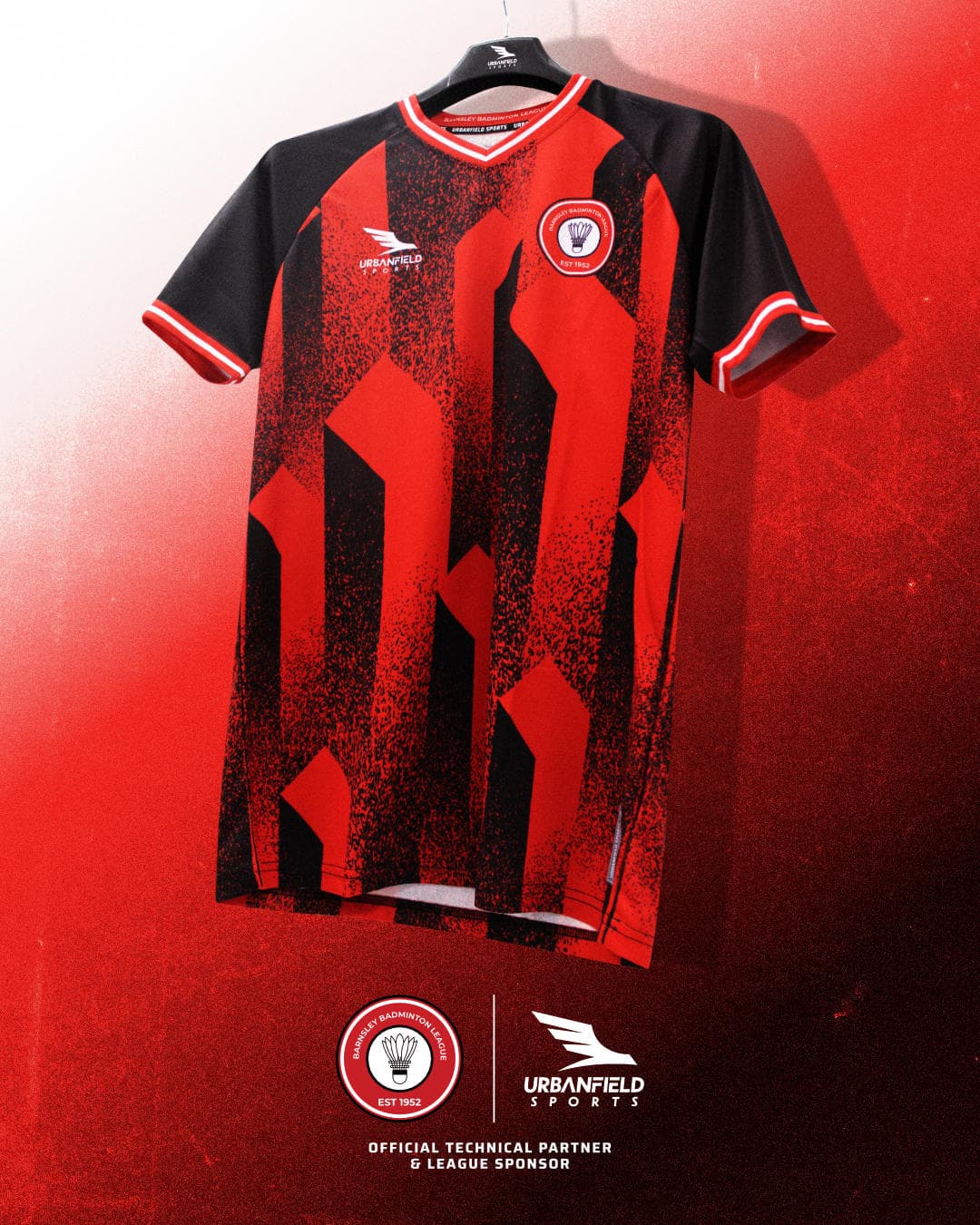 Barnsley Badminton League shirt on a black hanger in front of a dark red gradient background.