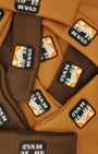 A group of Urbanfield Sports, be wild caramel and chocolate coloured beanies.