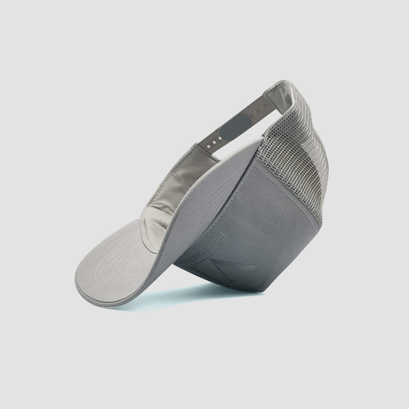 Close up of Find Your Inner Vi trucker cap in light grey