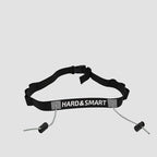 Front view of Hard & Smart Sports Coaching triathlon race belt in black