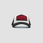 Front view of Urbanfield Sports sunset trucker cap in black and white