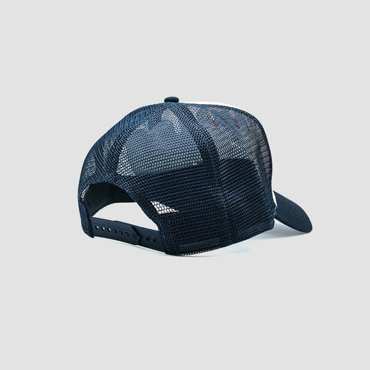 Rear view of Urbanfield Sports palm beach trucker cap in navy blue and white