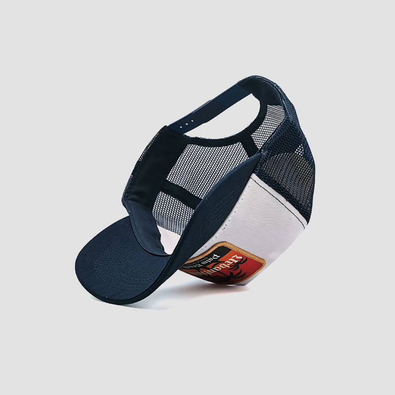 Under side view of Urbanfield Sports palm beach trucker cap in navy blue and white